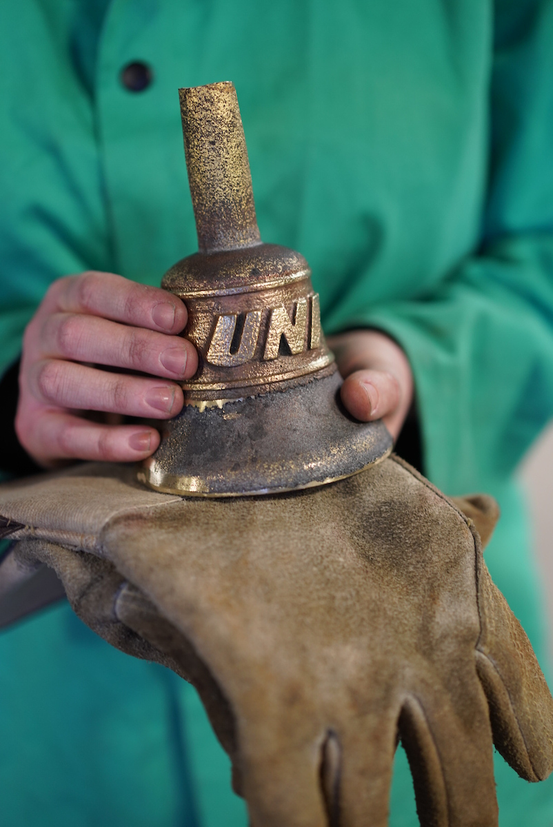 A UNI hand bell that has been metal casted at MCC.